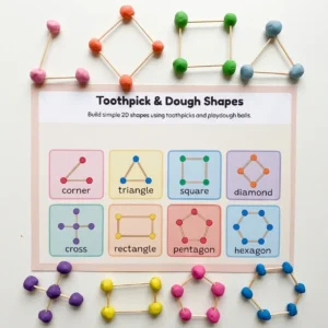 Child building a triangle with playdough balls and toothpicks on the Clay Dough Shapes 2D geometry activity mat